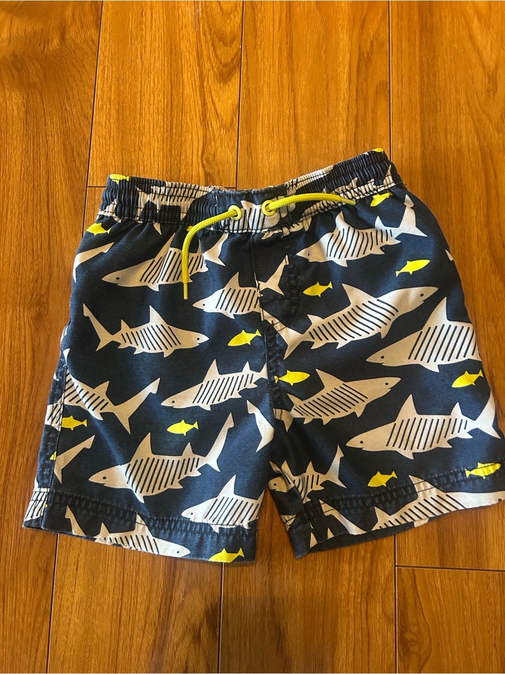 Boys Navy Shark Print Swim Trunks with Yellow Accents
